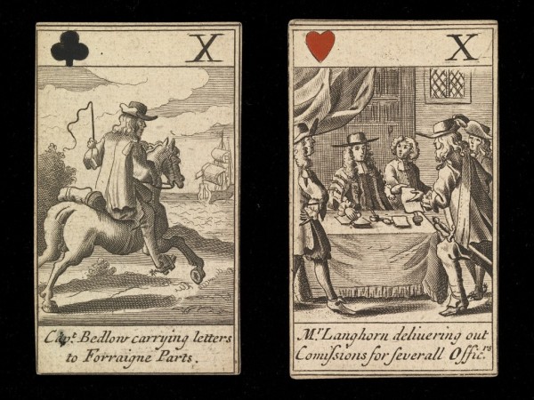 Two old playing cards: 10 of clubs and 10 of hearts.